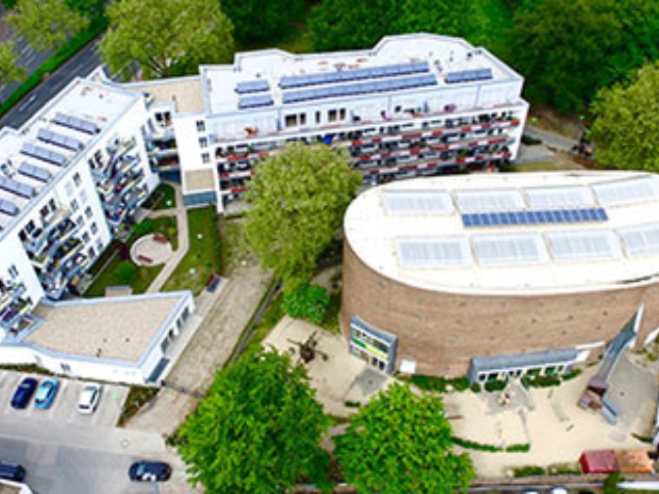 Der Gebäudekomplex des Wohnquartiers Platanenhof in Münster aus der Vogelperspektive
