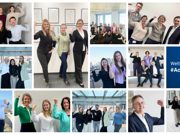 Mitarbeiterinnen und Mitarbeiter der NRW.BANK mit Geste zum Weltfrauentag