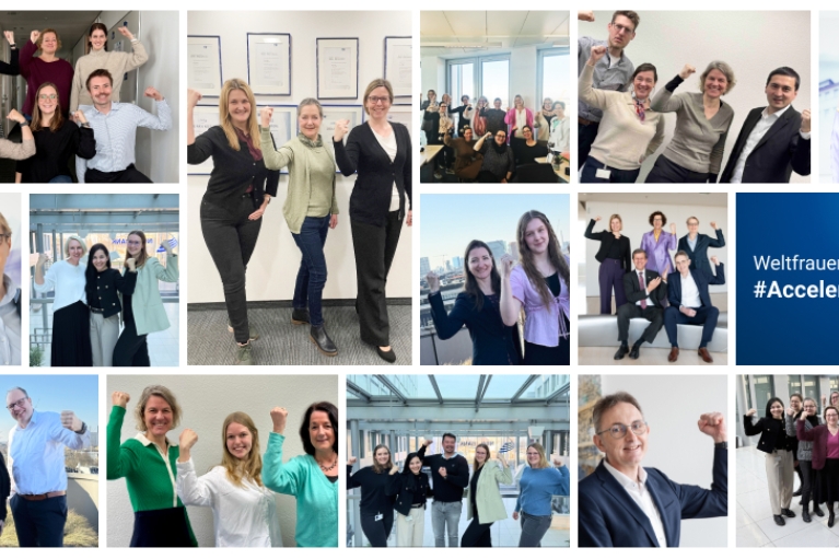 Mitarbeiterinnen und Mitarbeiter der NRW.BANK mit Geste zum Weltfrauentag