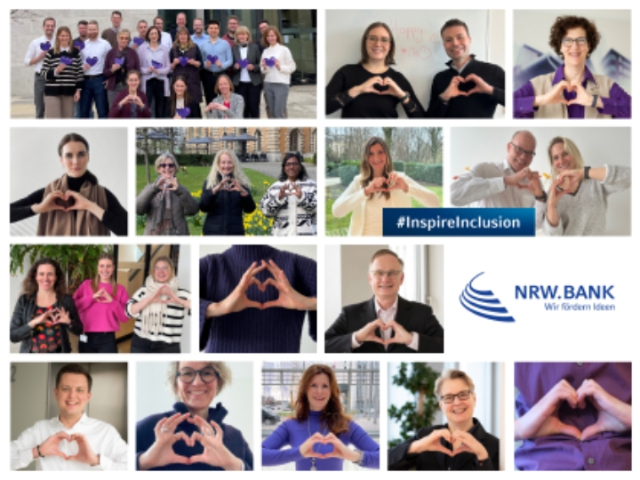 Mitarbeiterinnen und Mitarbeiter der NRW.BANK mit Geste zum Weltfrauentag