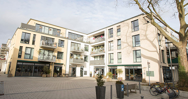 Innenhof und Fassade des Wohnquartiers Claudiushöfe in Bochum