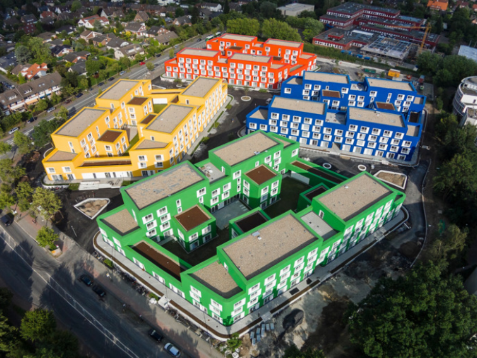 Studierendenwohneim in Münster von oben, Häuser mit grüner, gelber, roter und blauer Fassade